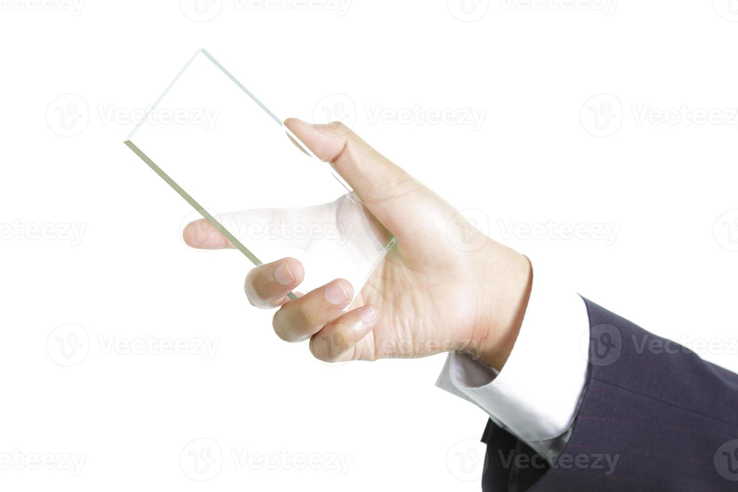 Hand holding blank glass photo