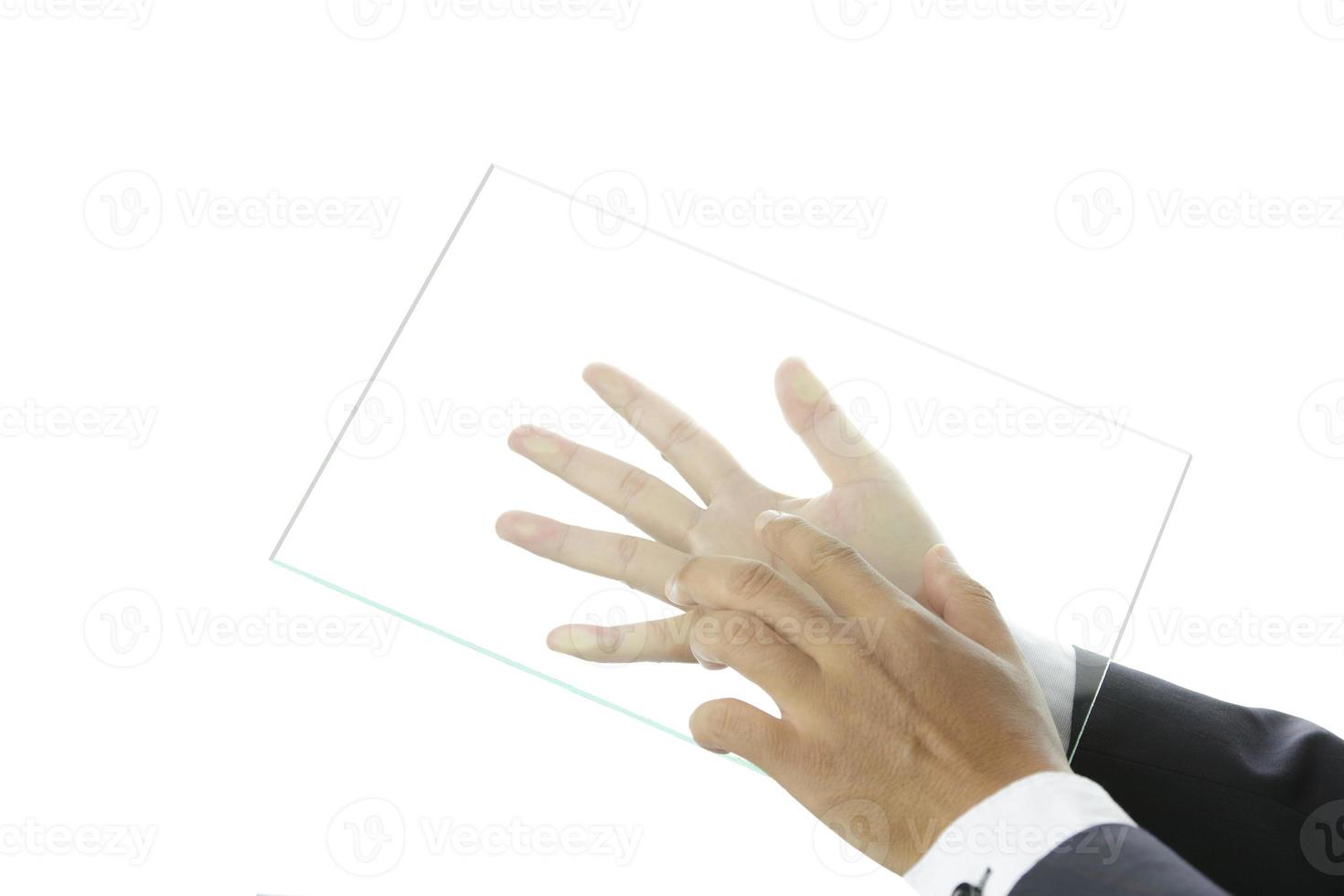 Hand holding blank glass photo