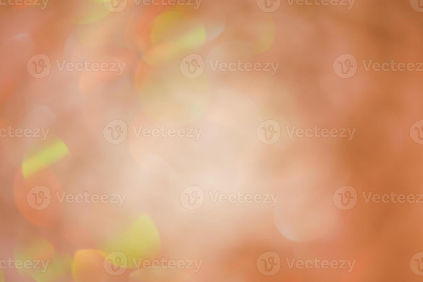 Defocus light brown orange and green glitter. Abstract bokeh light background. photo