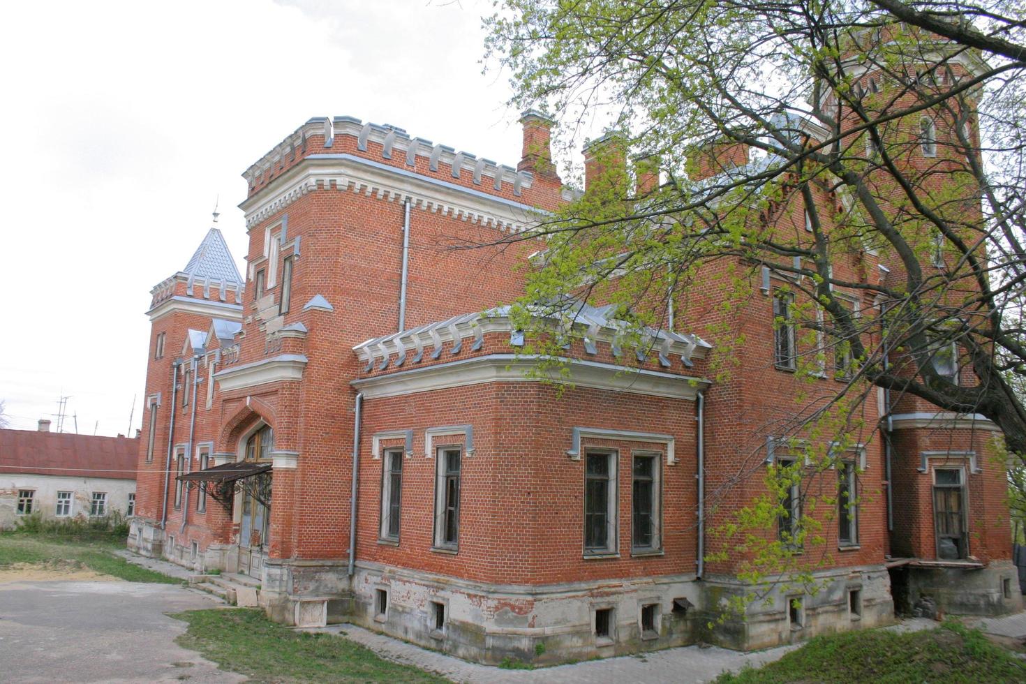 Abandoned red brick castle photo