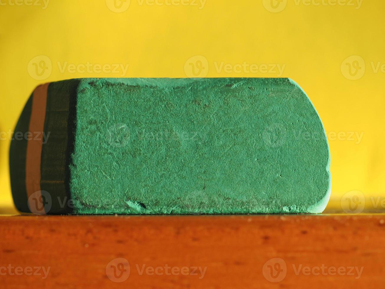 green pencil rubber with copy space photo