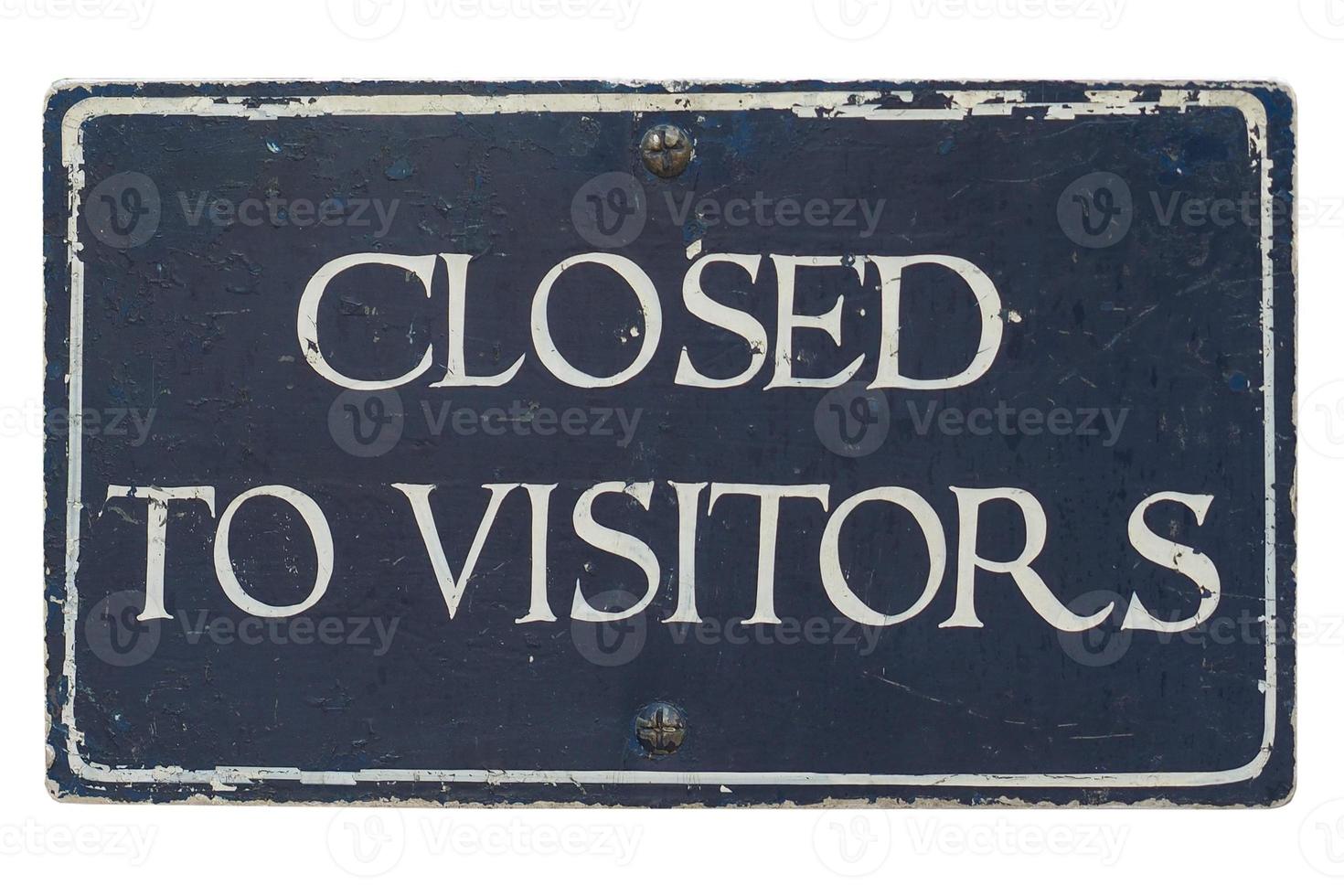 Closed to visitors sign isolated over white photo