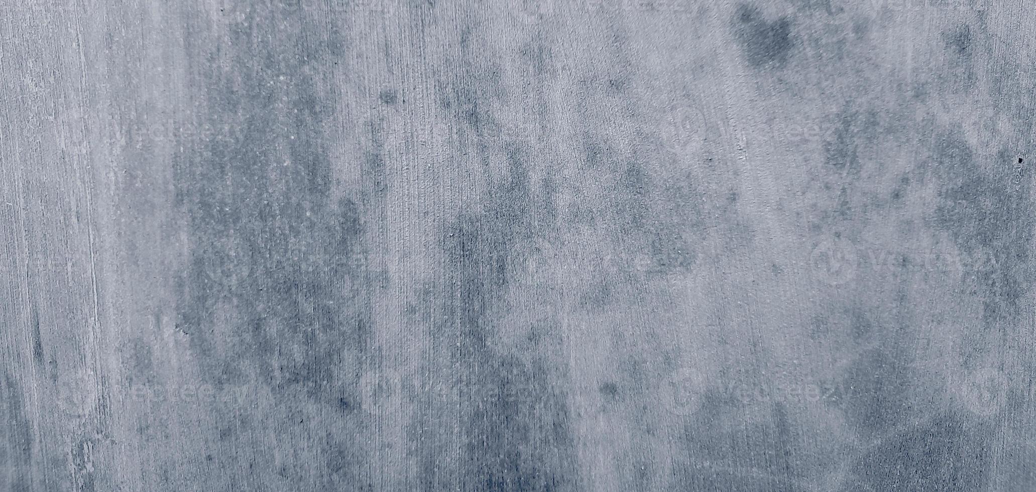 Gray cement concrete texture. Wall scratches background photo