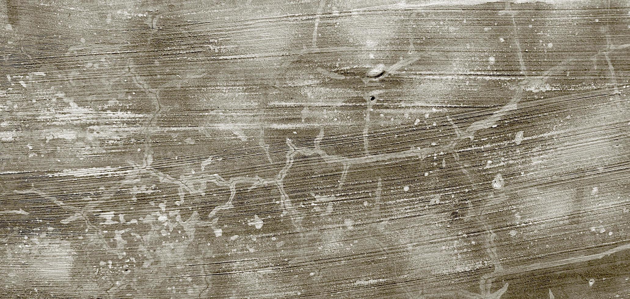 Textura de hormigón de cemento gris. pared arañazos fondo foto