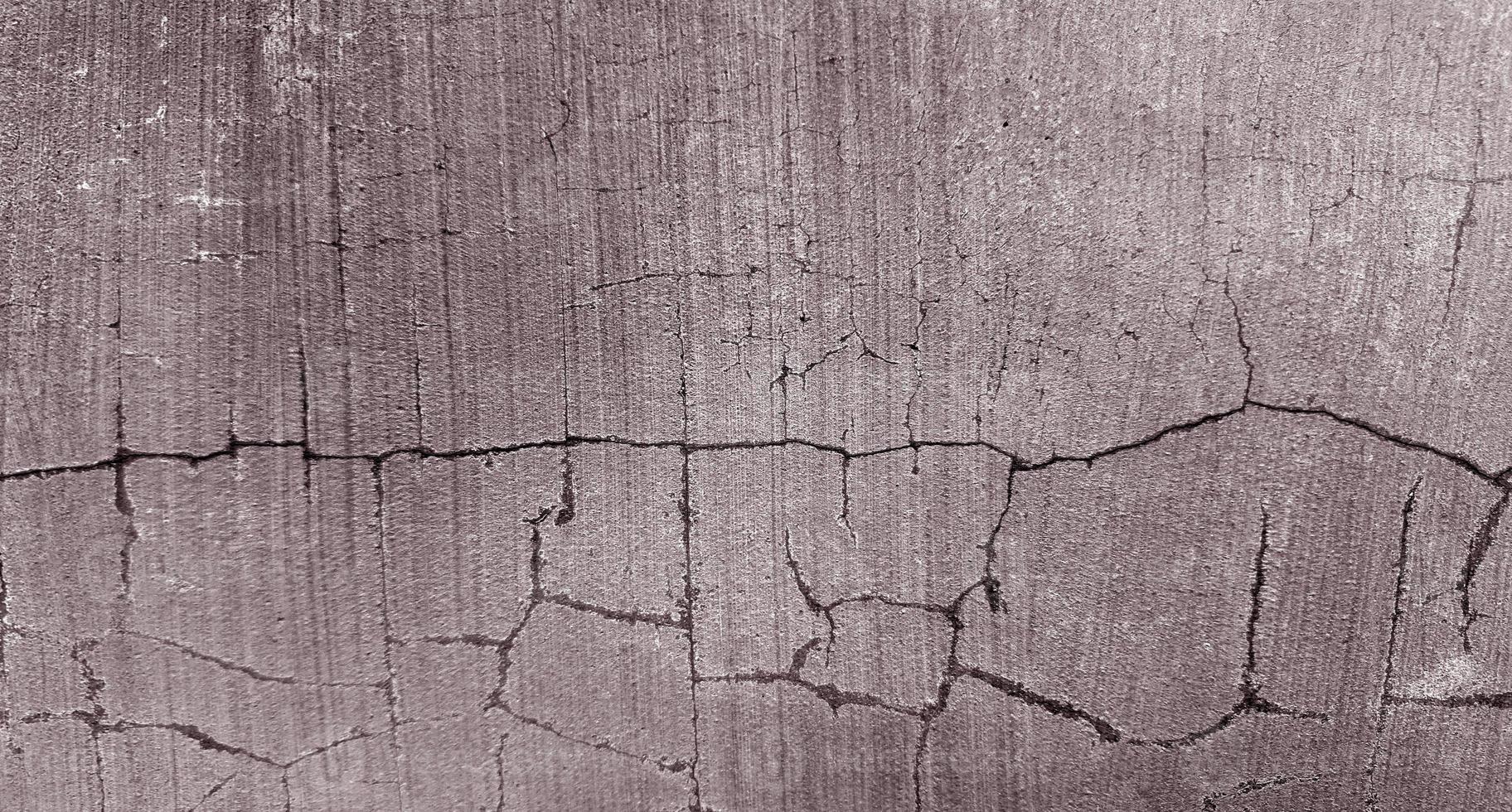 Gray cracked cement texture for background photo