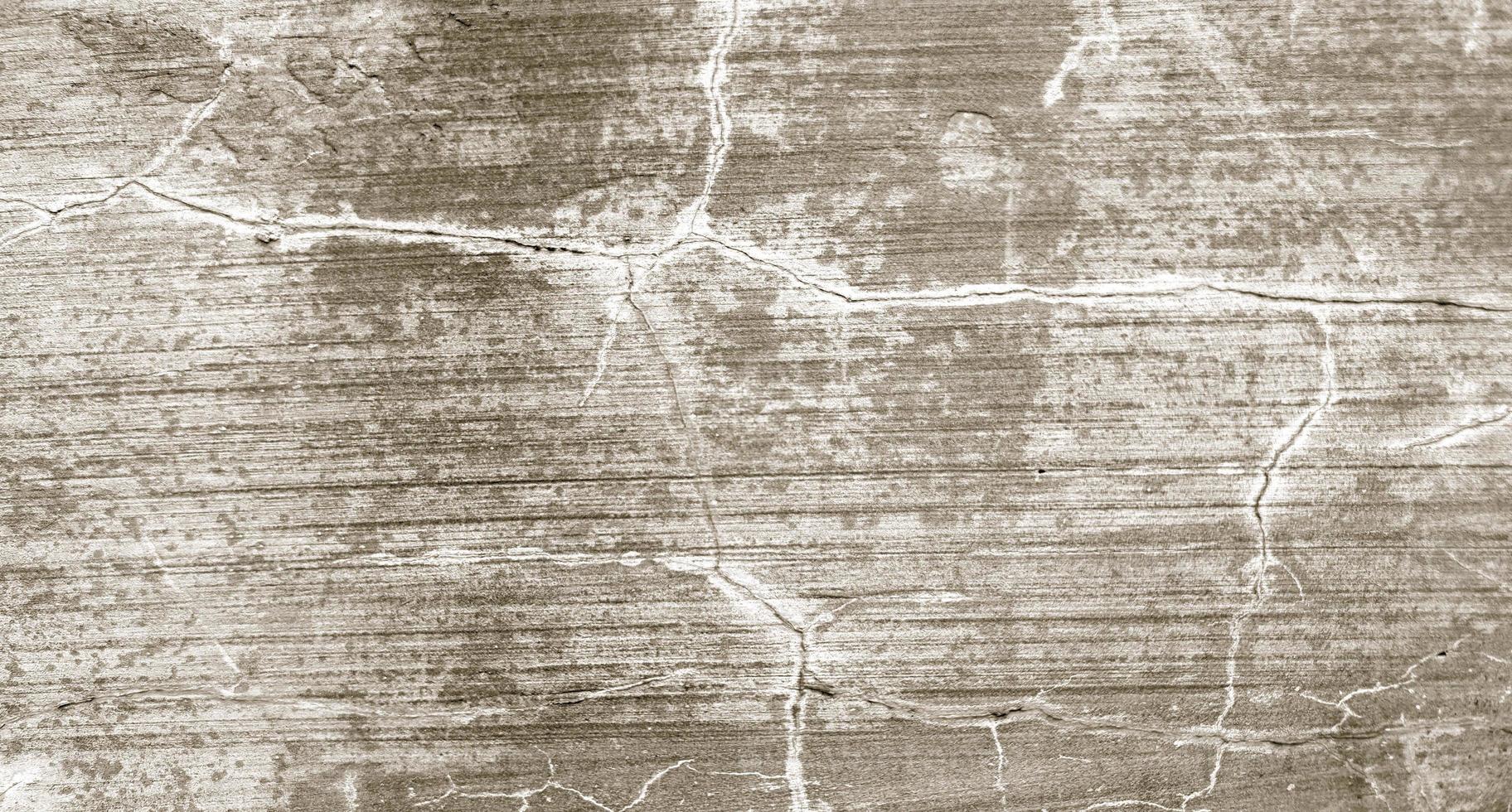 Gray cracked cement texture for background. wall scratches photo