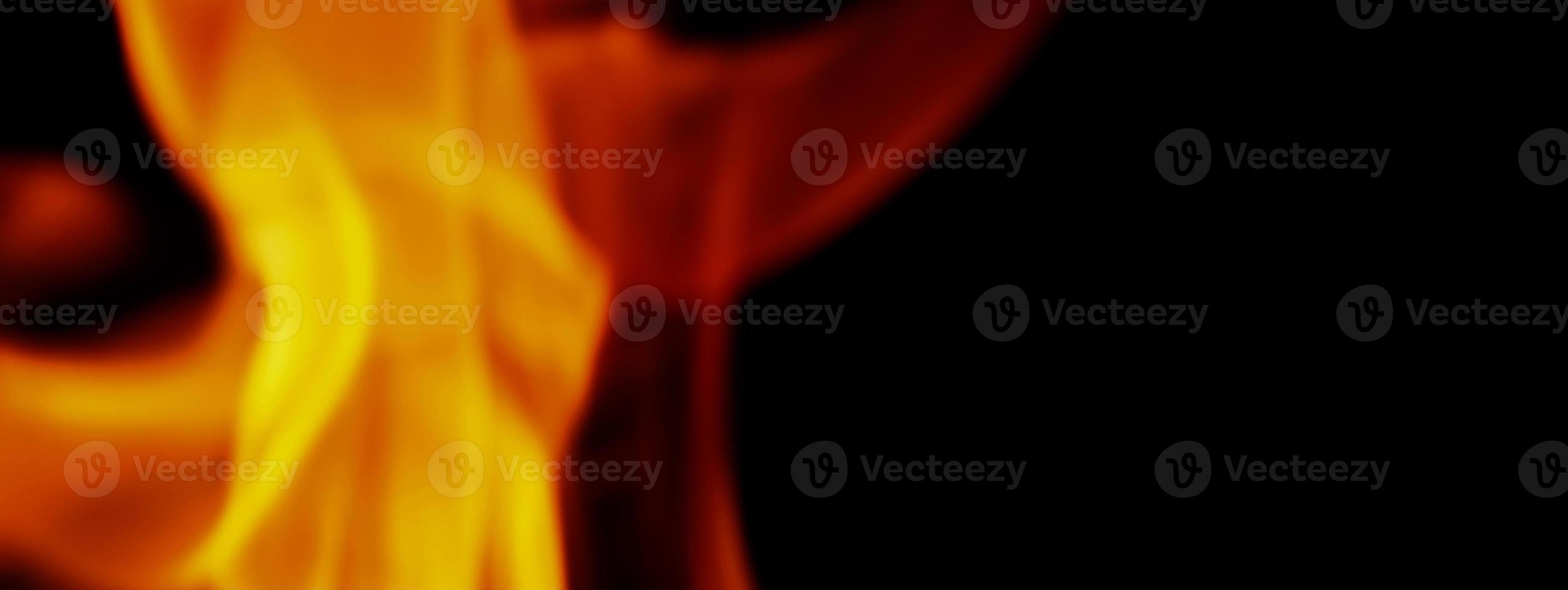 Fire background. Abstract burning flame and black background. photo