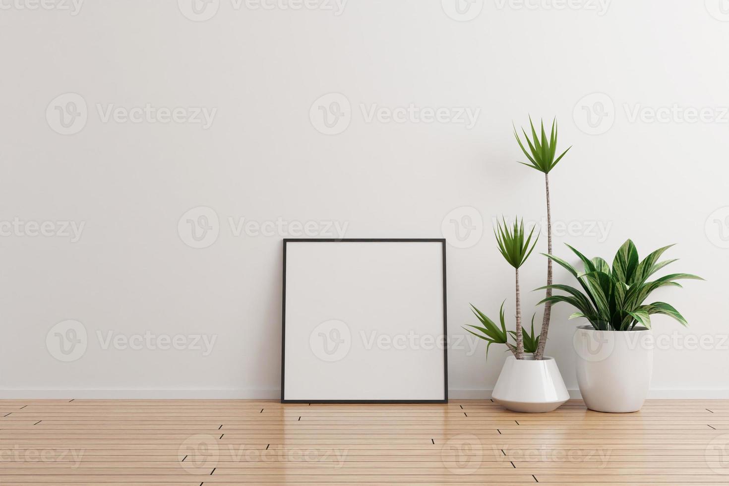 Black square photo frame mockup on white wall empty room with plants on a wooden floor