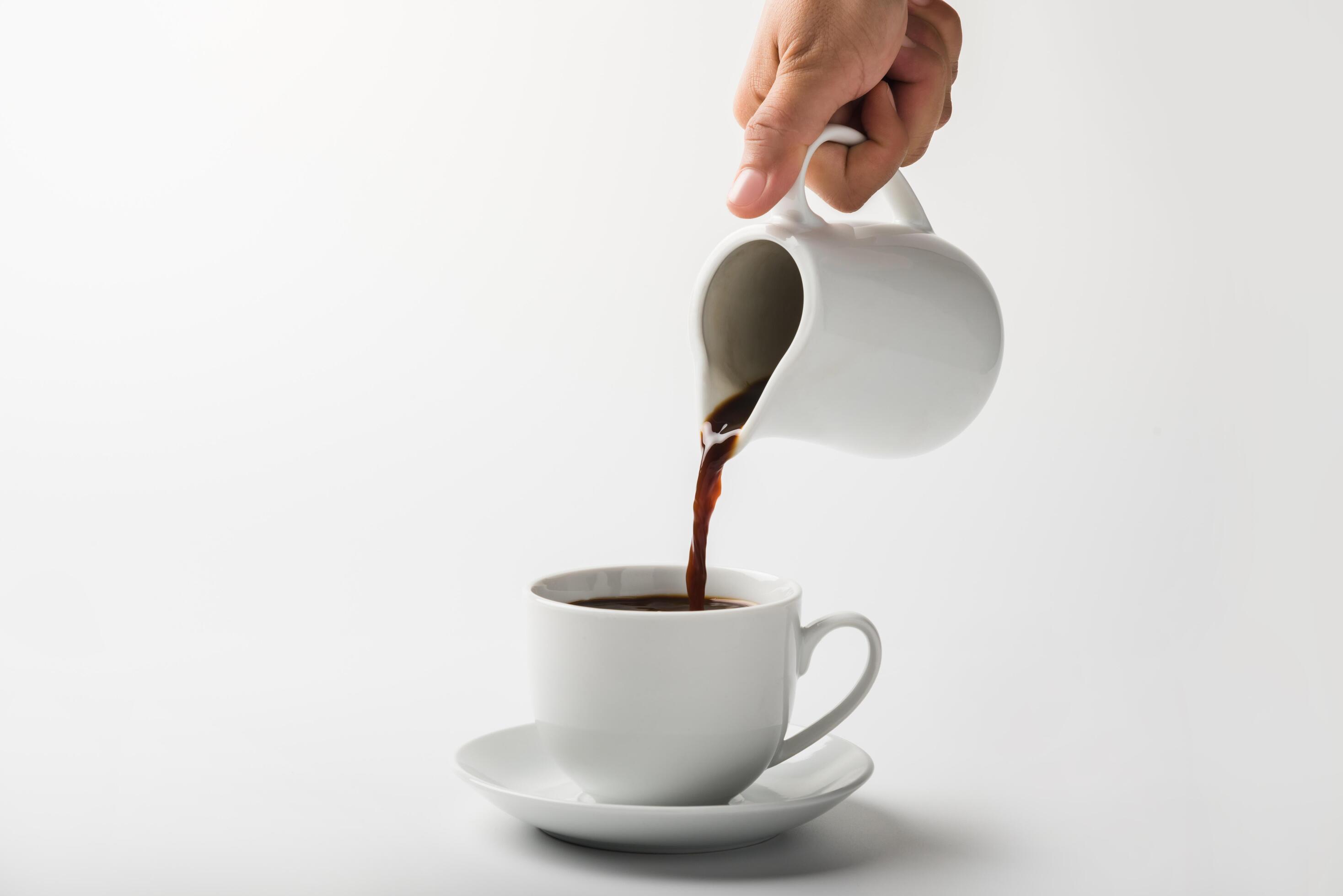 Pouring Coffee On A Cup Isolated On White Background 3823386 Stock pouring-coffee-on-a-cup-isolated-on-white-background-3823386-stock