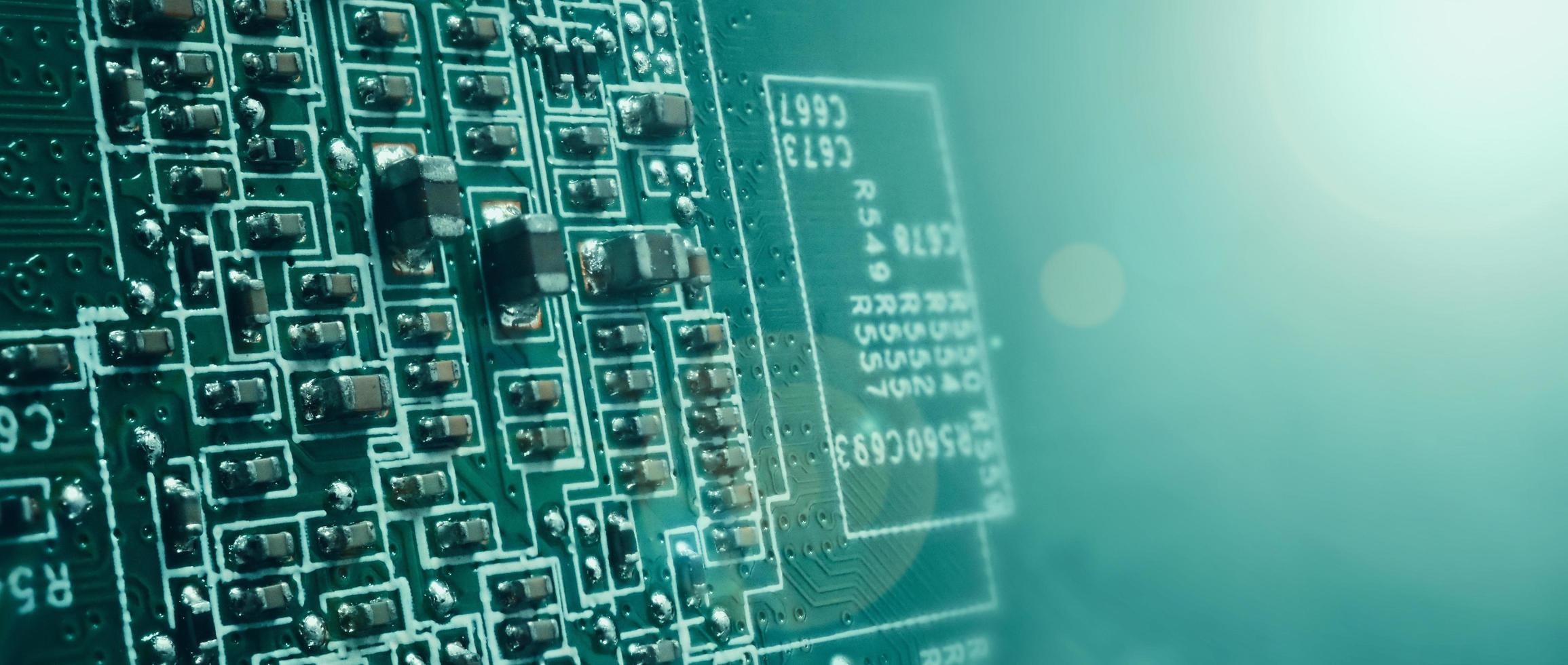 Semiconductor. cpu chip located on the green motherboard of the computer. photo