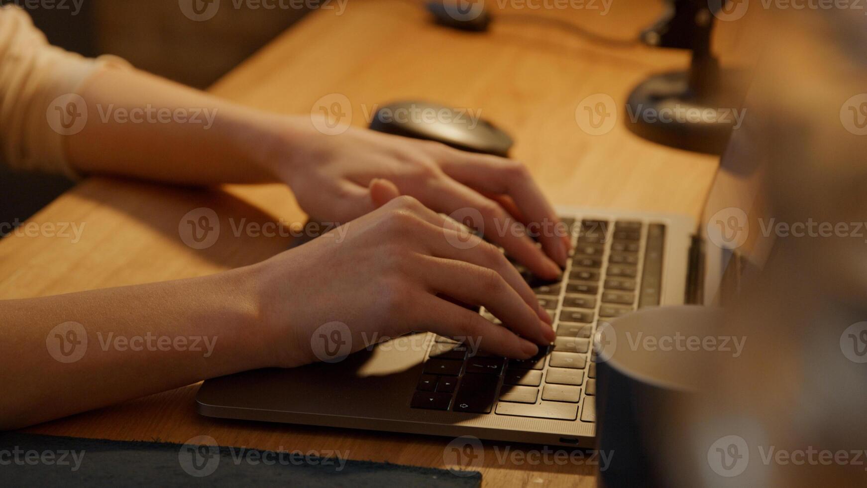 Mature woman having online call on laptop photo