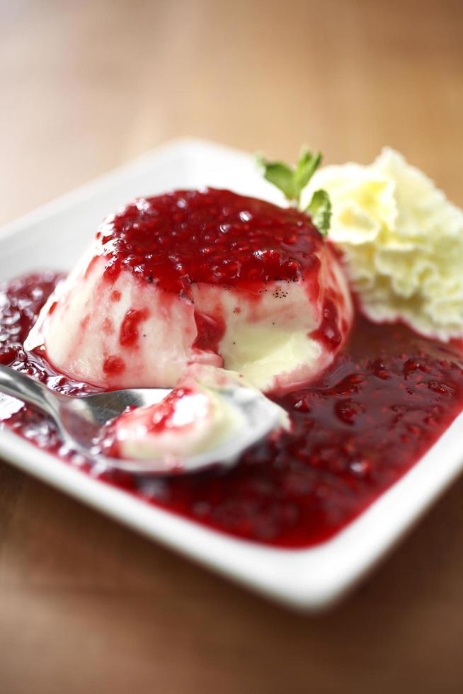 Strawberry custard on ceramic dish in cafe photo