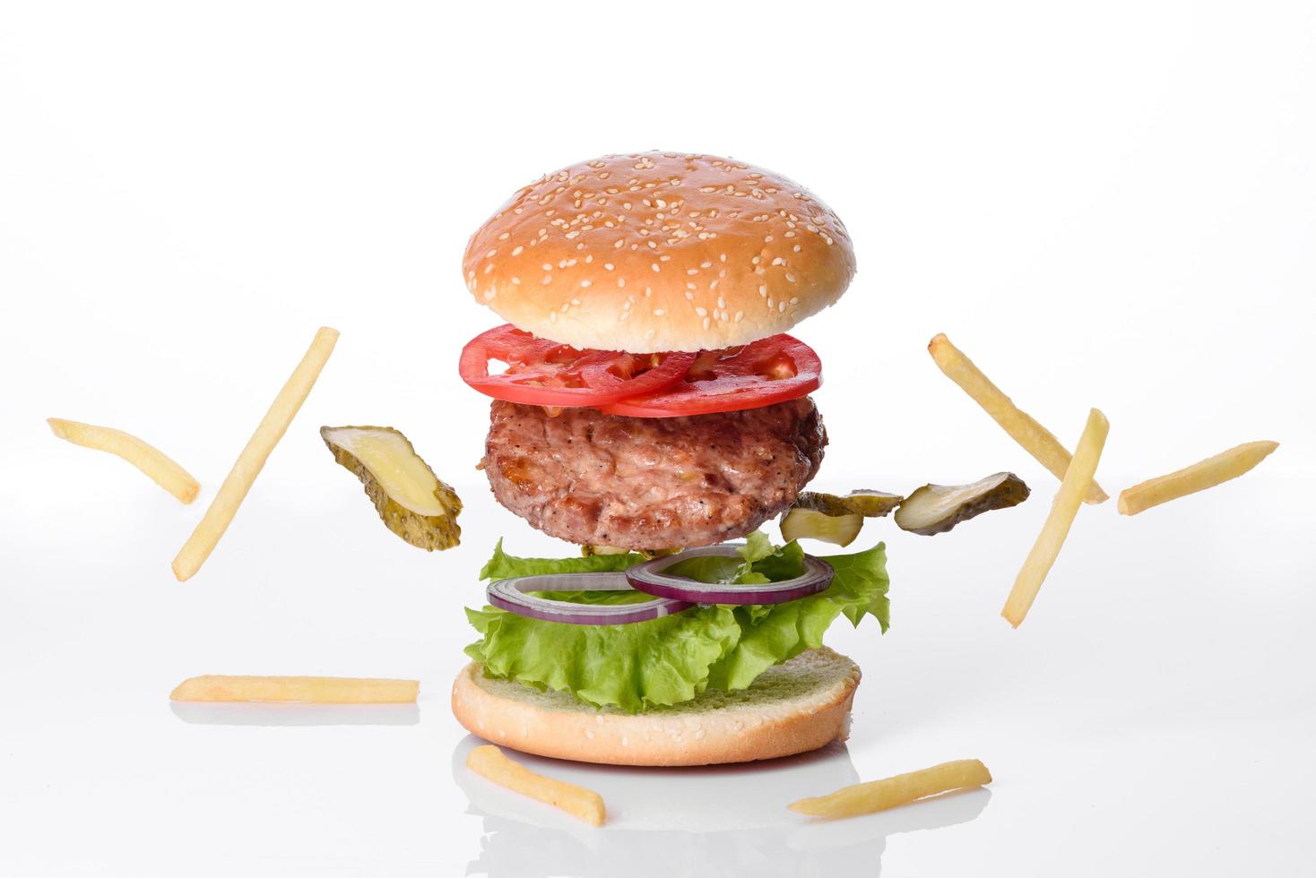 Craft beef burger and french fries on a white background photo