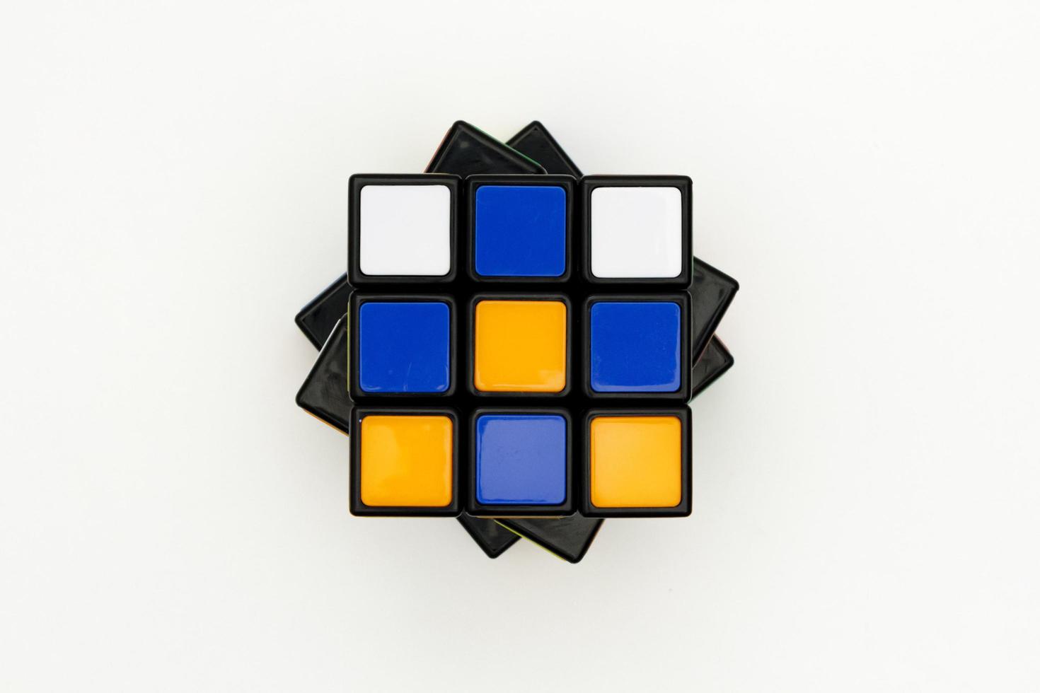 Saint-Petersburg, Russia - JULY 17, 2019 - Rubik's cube, rubik's cube top view isolated, rubik's cube on white background, colorful puzzle, math problem, charging for your brain, cube rainbow palette photo