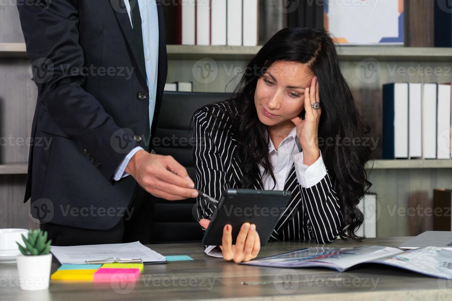 young caucasian businesswoman has troubles with new project that manager consult. business concept photo