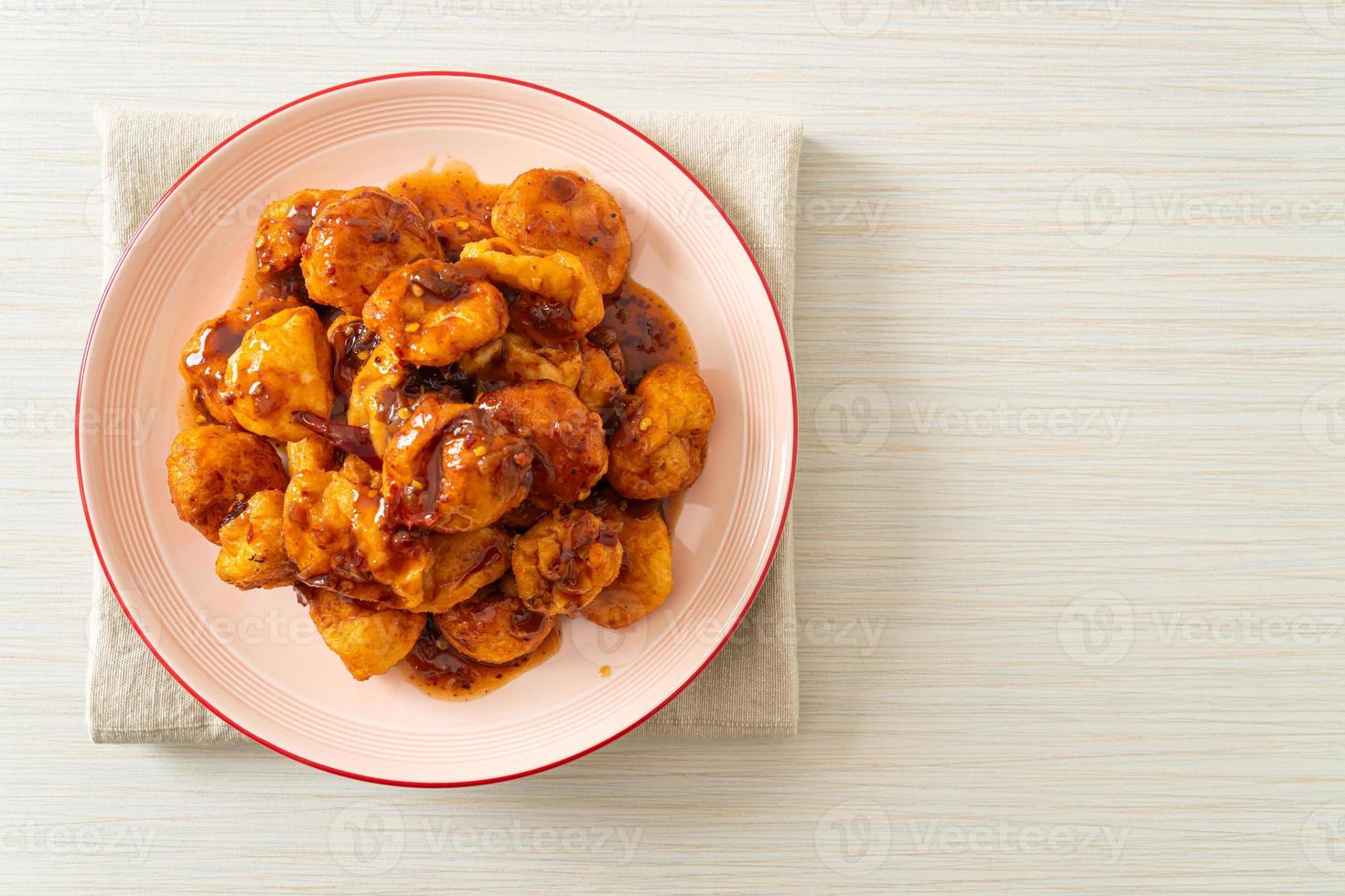 fried meatballs with spicy dipping sauce photo