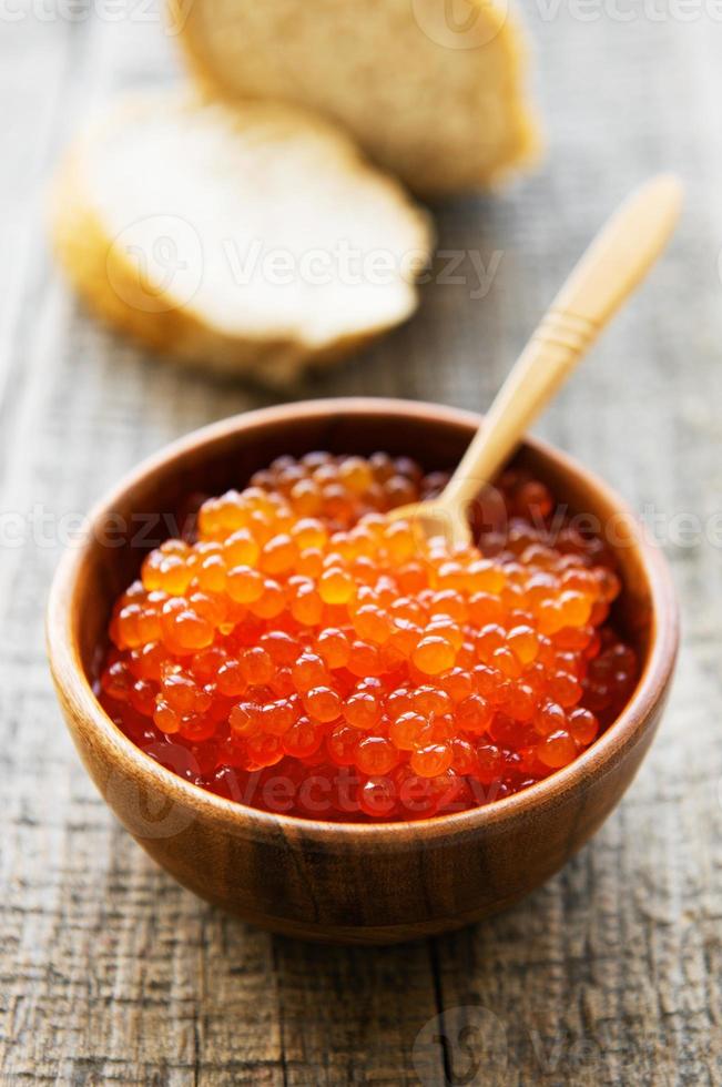 Red caviar in bowl photo