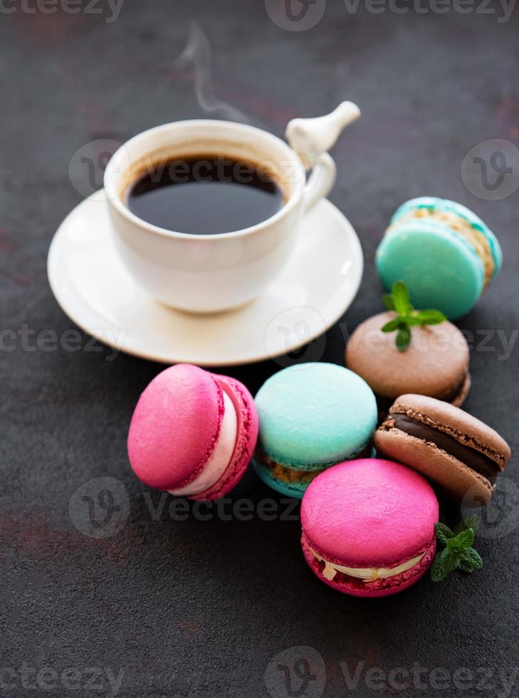 Cup of coffee and macaroons photo