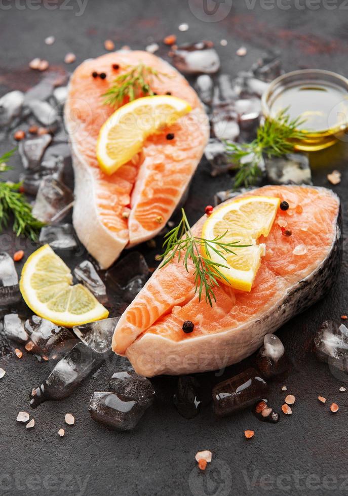 Raw salmon steaks photo