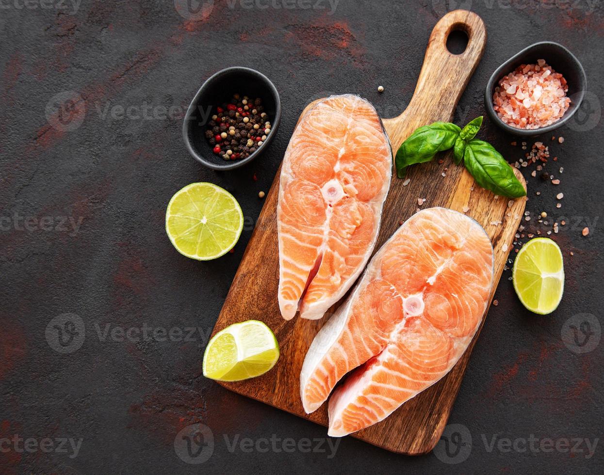 Raw salmon steaks photo