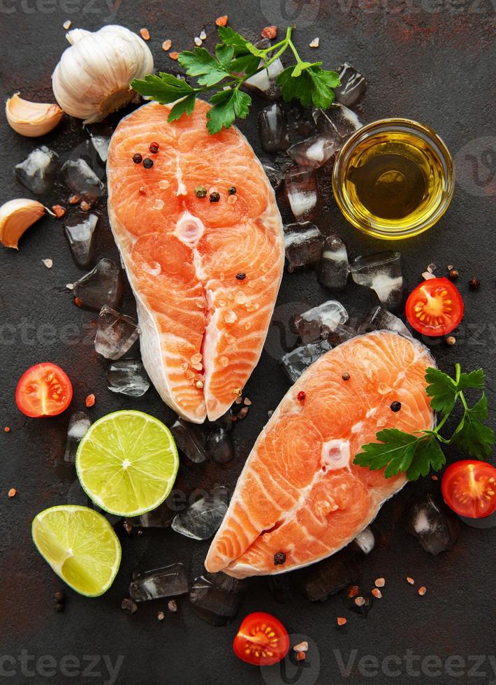 Raw salmon steaks photo