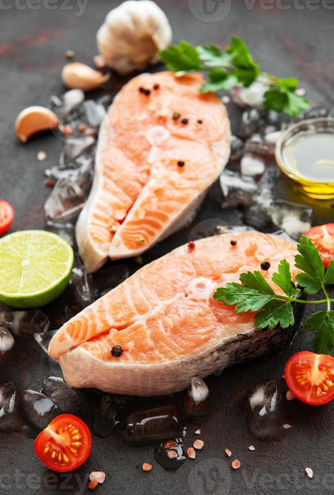 Raw salmon steaks photo