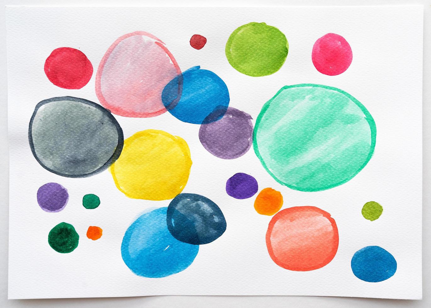 Watercolor hand painted circle shape design elements. Set of multicolored watercolor dots. Watercolor brush collection. photo