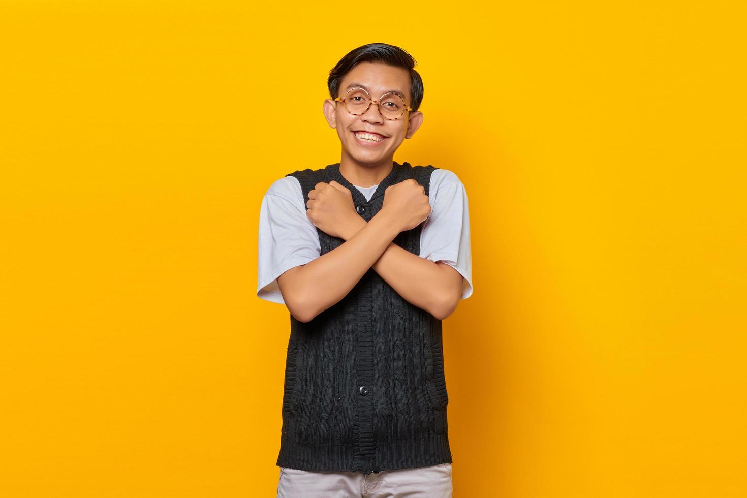 Portrait of handsome Asian man raising hand with angry expression photo