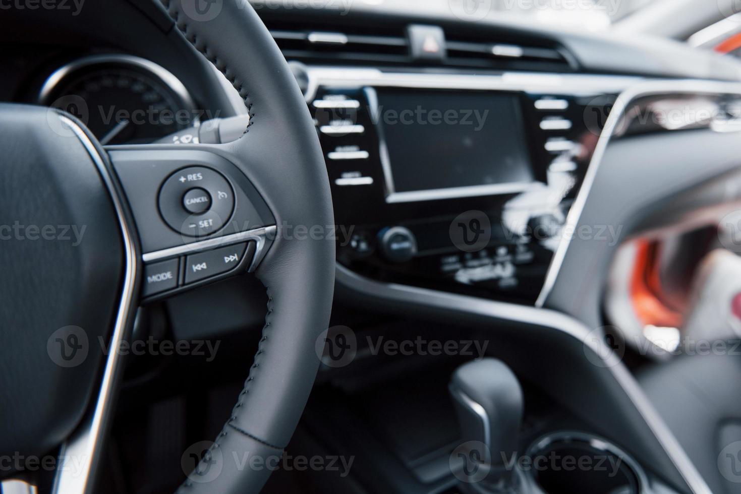 View of the interior of a modern automobile showing the dashboard photo