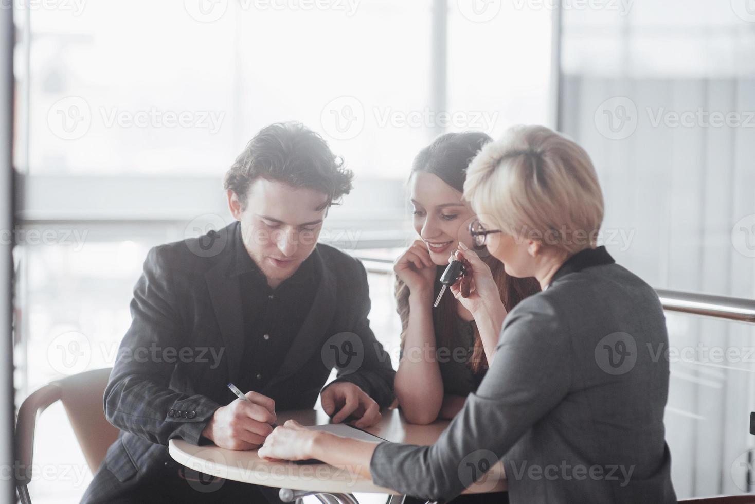Team job succes. Photo young business managers working with new startup project in office. Analyze document, plans. Generic design notebook on wood table, papers, documents