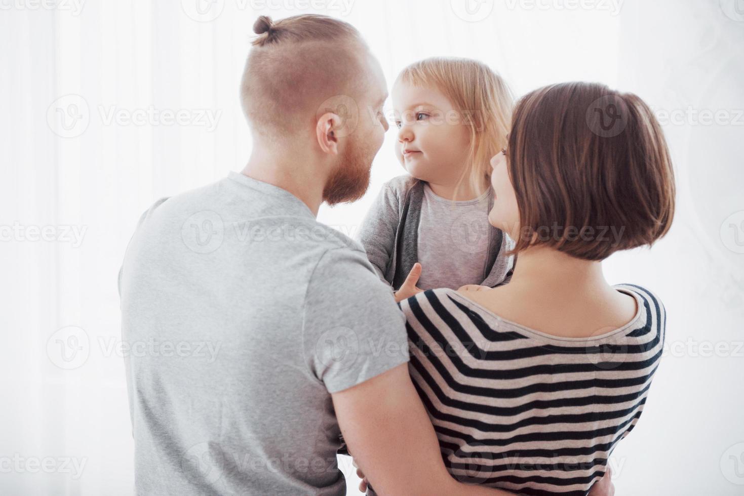 Happy family spending time with home. photo