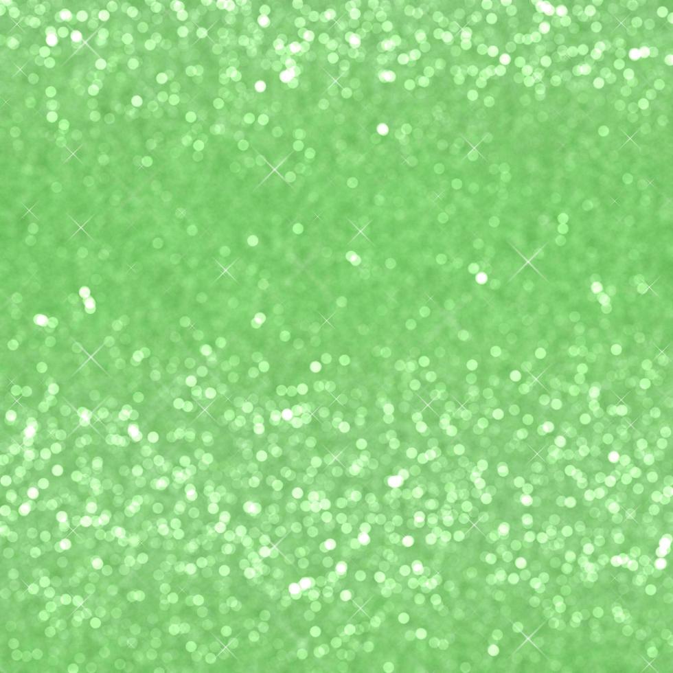 green glitter blurred background photo