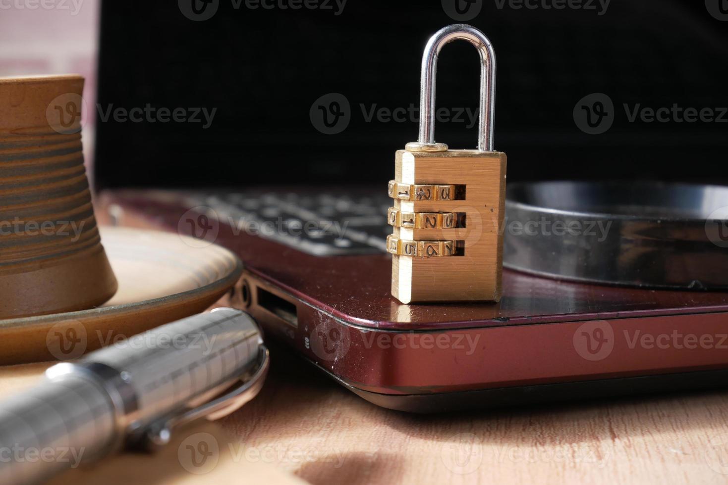 internet safety concept with padlocked on computer keyboard photo