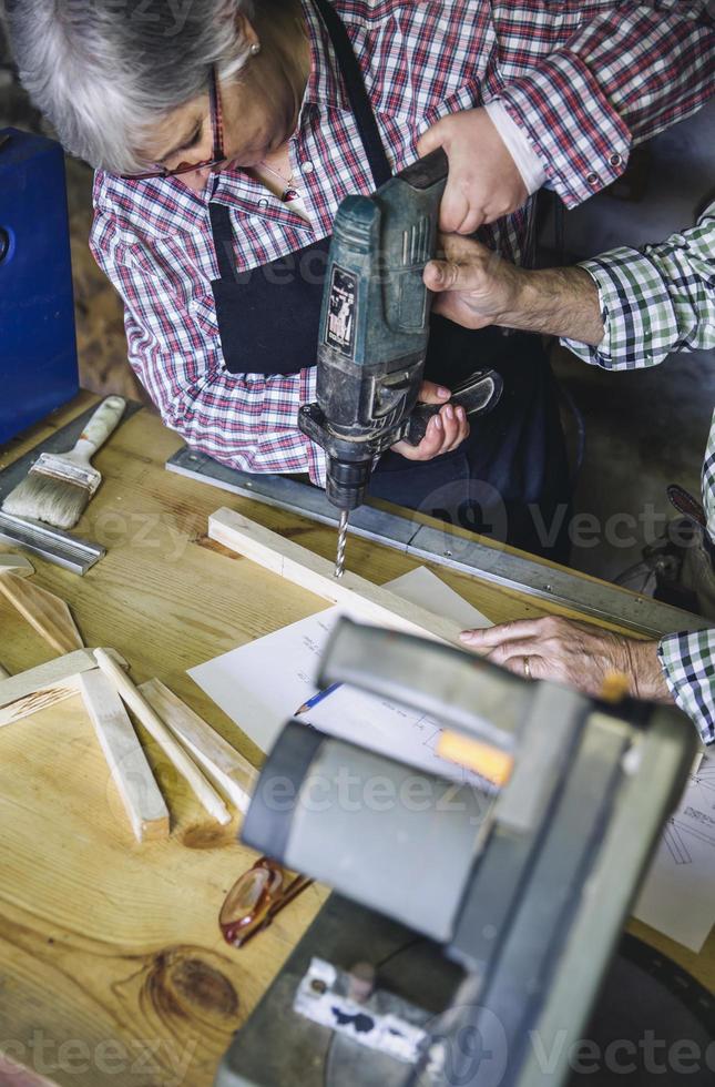 Senior couple in a carpentry photo