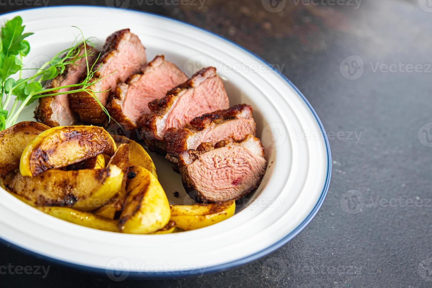 duck breast snack on the table photo