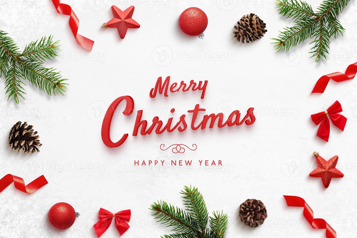 Merry Christmas and Happ New Year greeting card with Christmas derorations. Red text surrounded by tree branches, balls, stars, cones, bows. photo