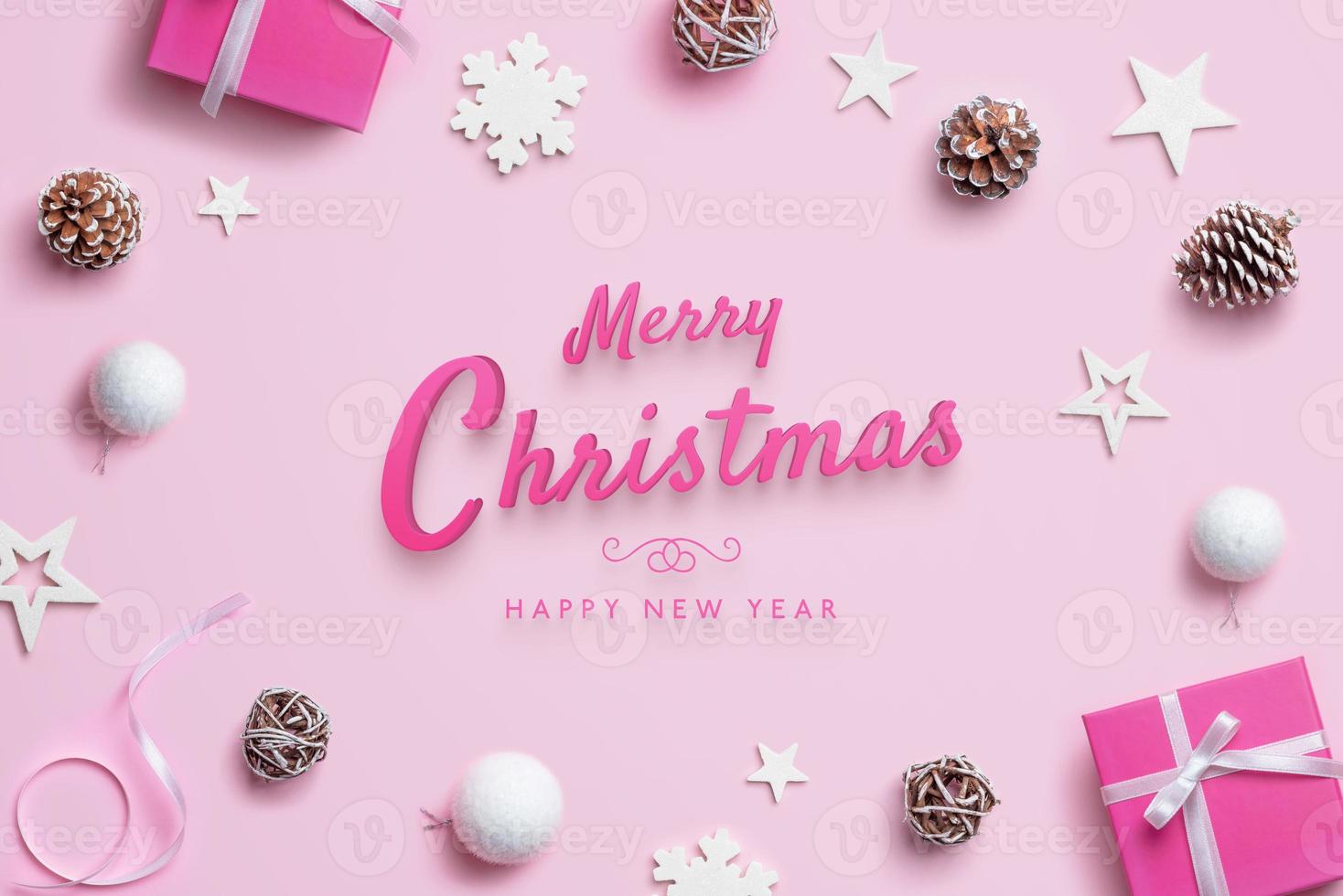 Merry Christmas and Happy New Year greeting card with Christmas decorations on pink pastel surface. Top view, flat lay photo