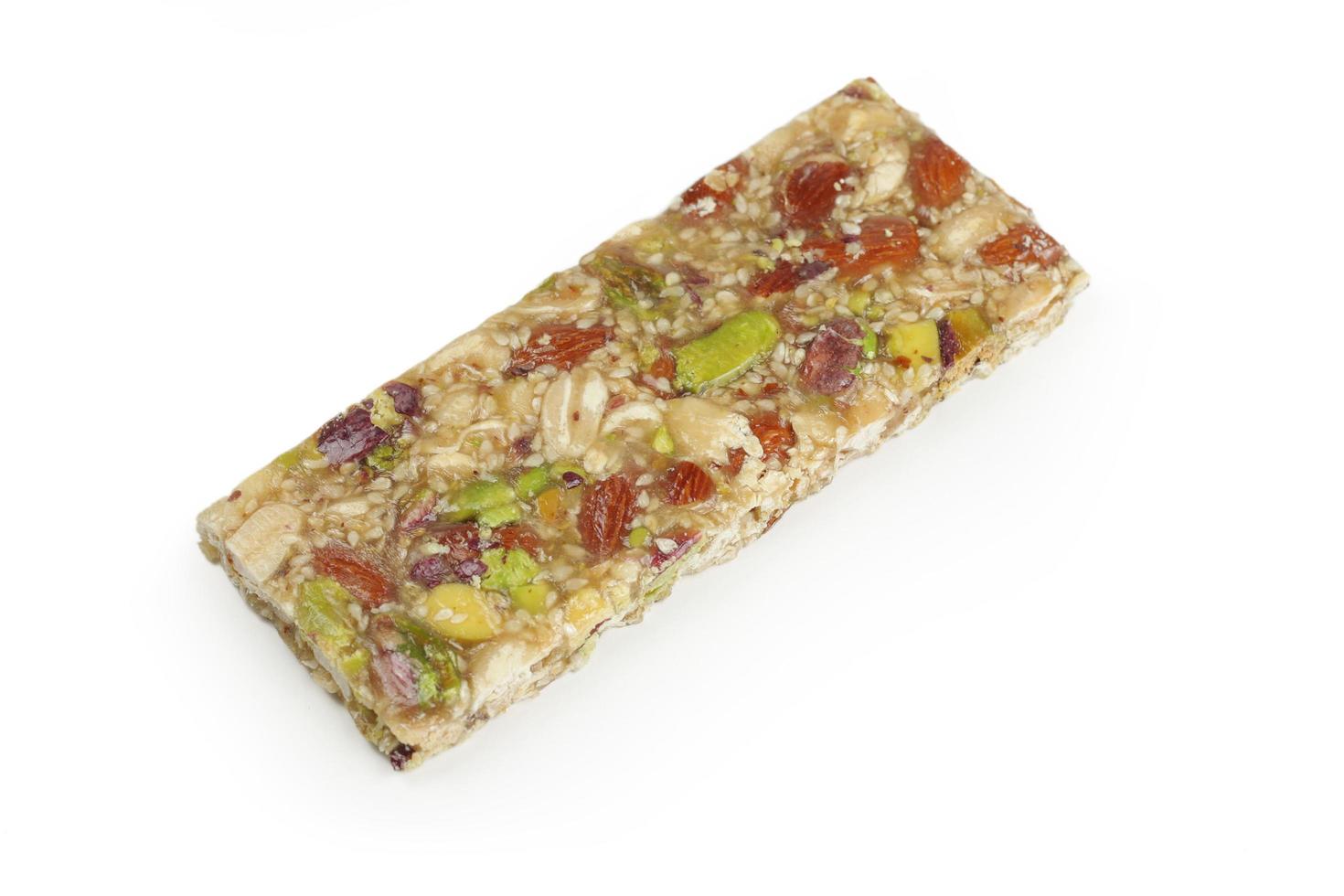 Energy bar with honey, nuts and cereals photo