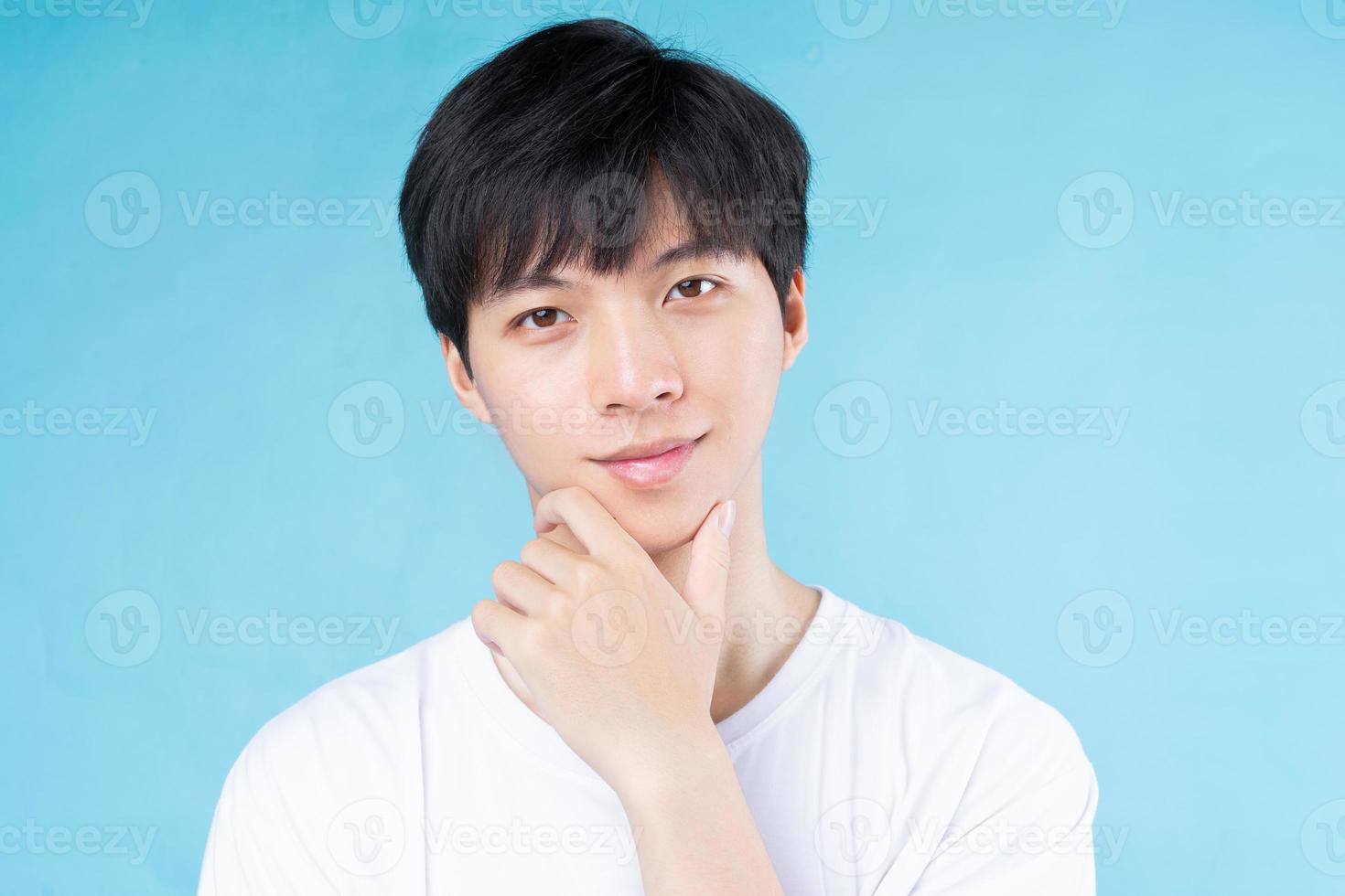 closeup young asian handsome man face photo