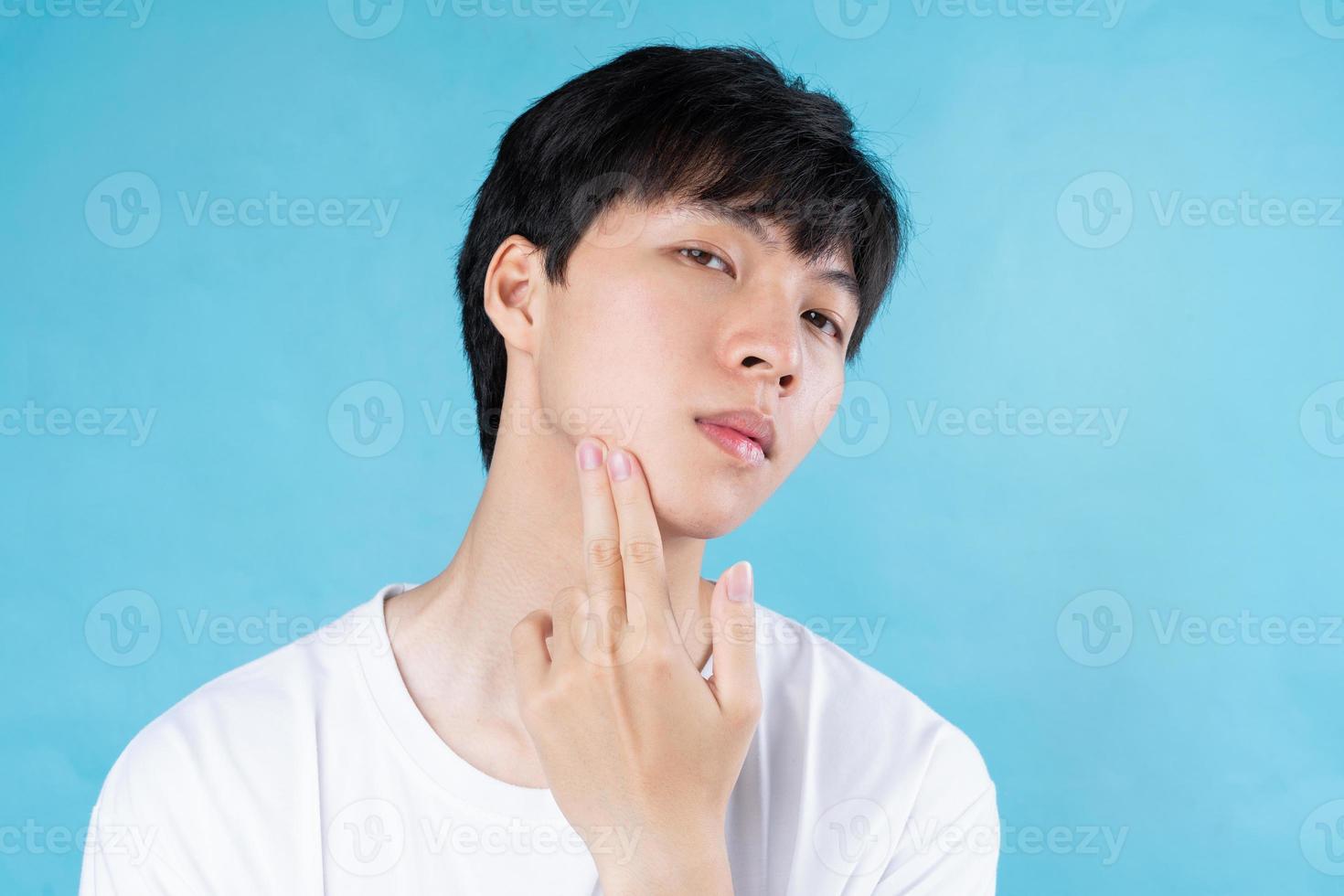 closeup young asian handsome man face photo