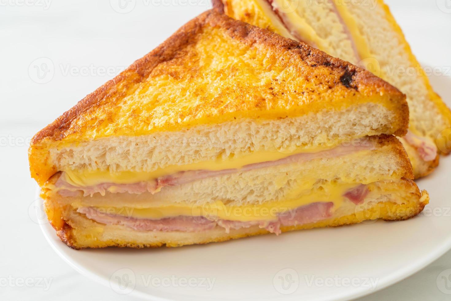 sandwich ham cheese on white plate photo