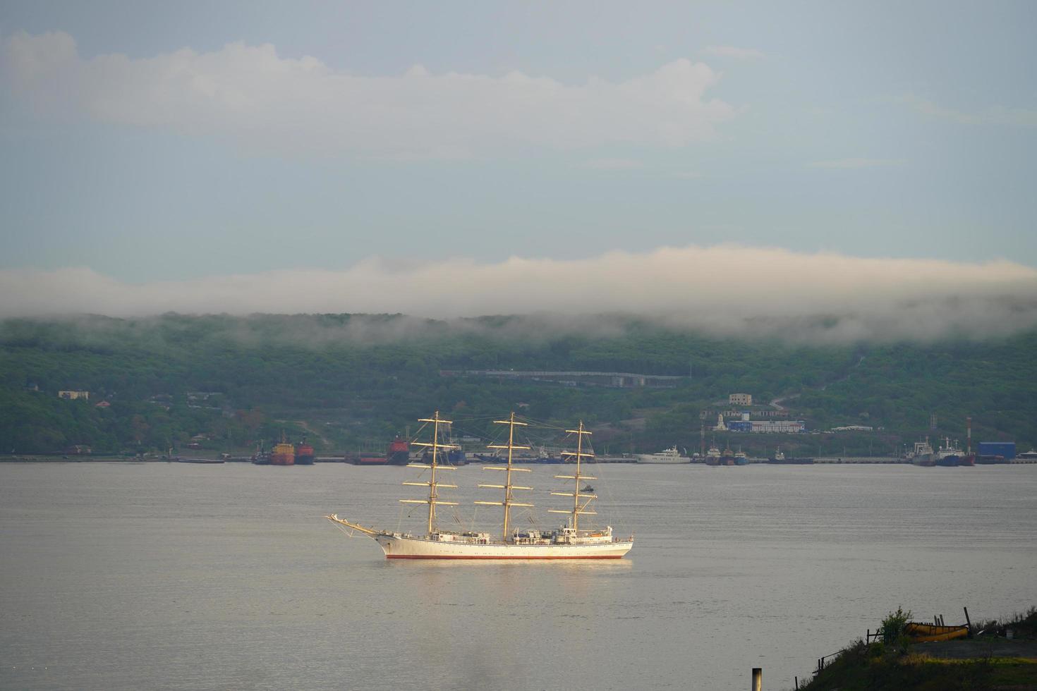 Seascape with a view of a sailboat photo