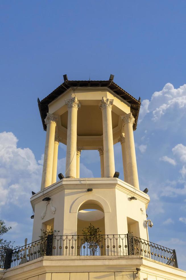 A white colonnade against the sky photo