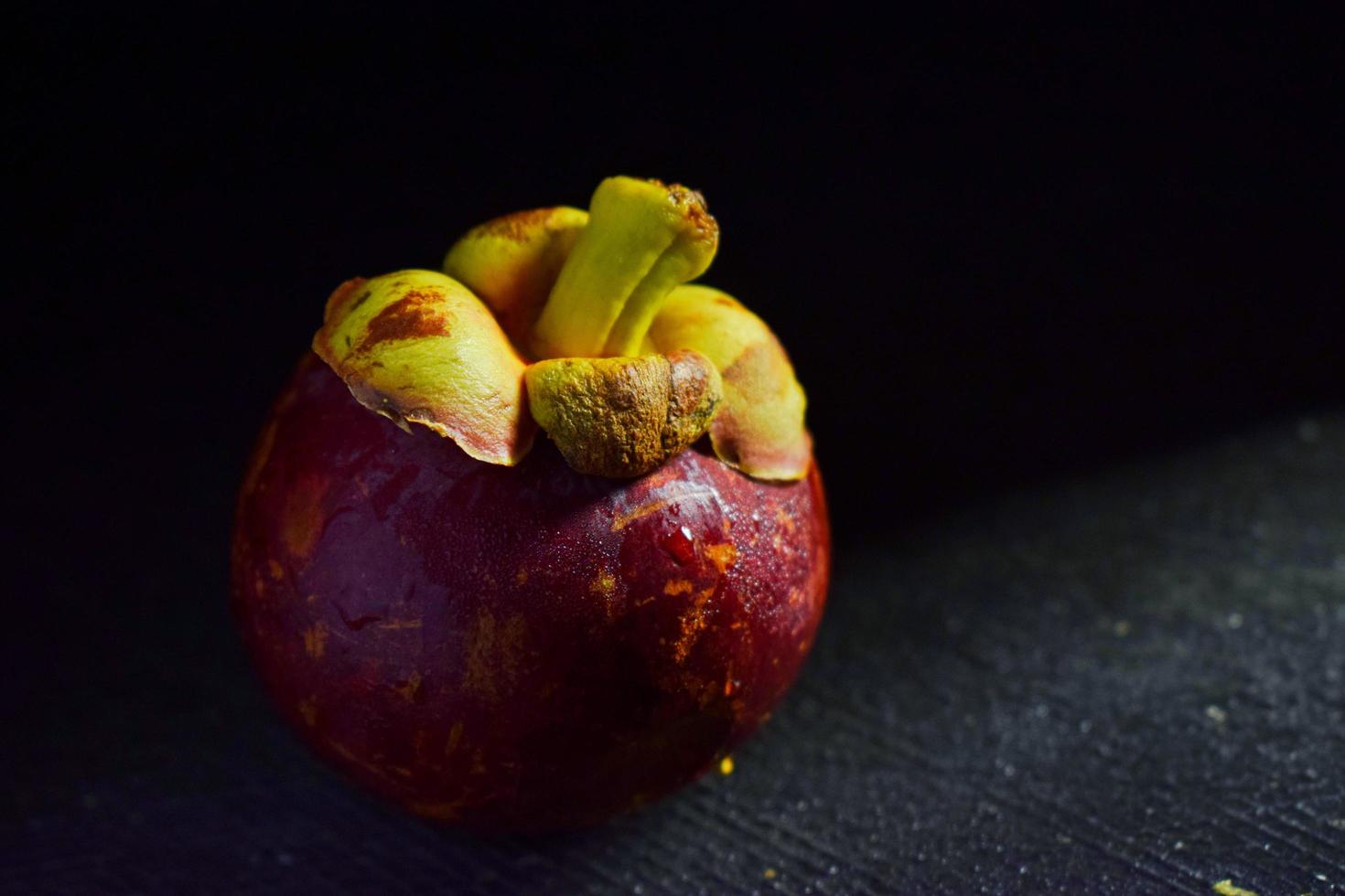 Fresh mangosteen fruit isolated on white back groundlack photo