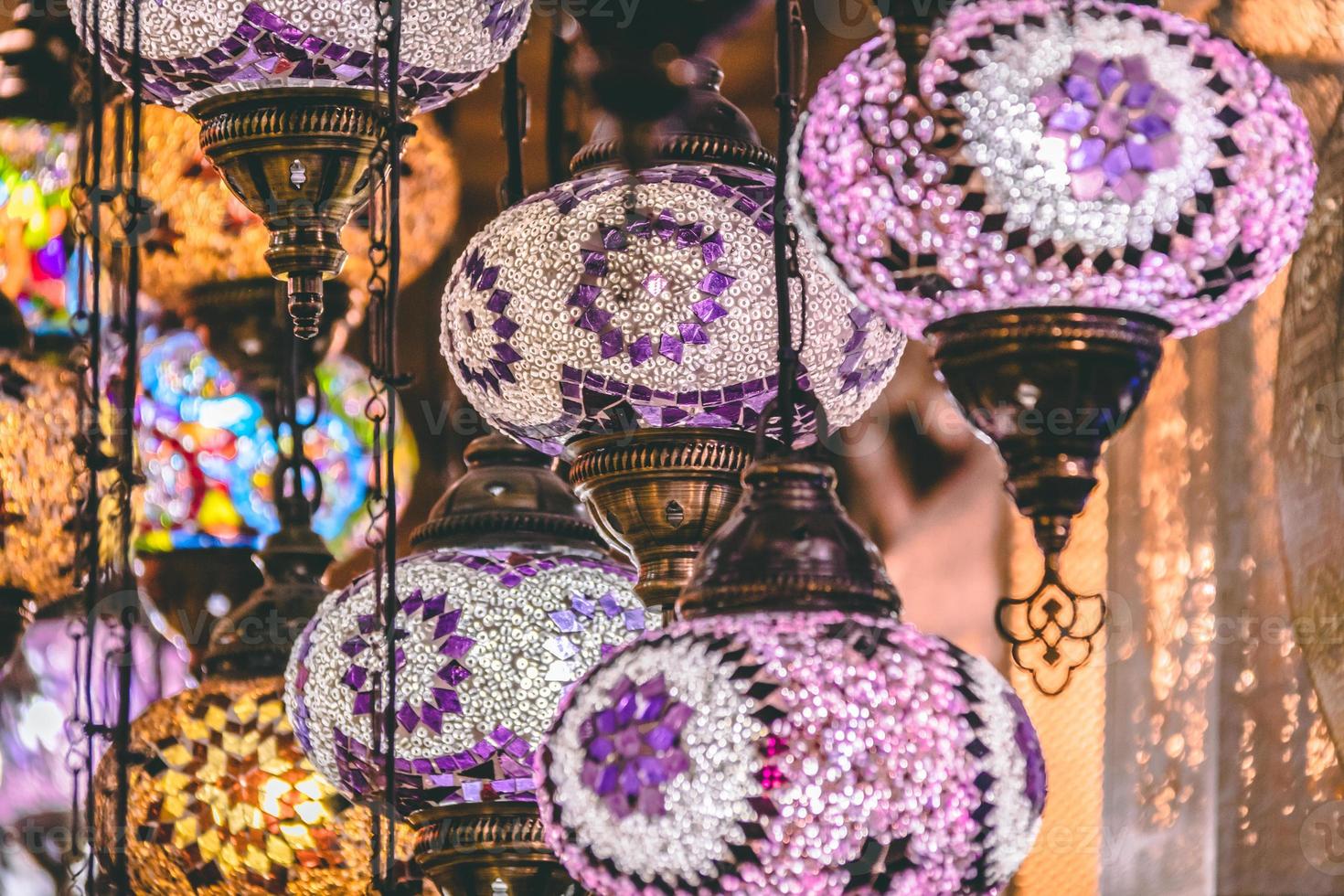 Moroccan or Turkish mosaic lamps and lanterns background selective focus photo