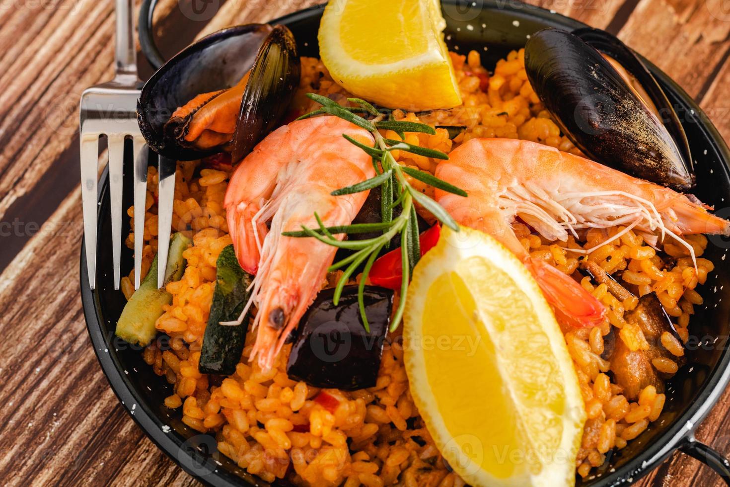 Traditional Spanish paella with seafood photo