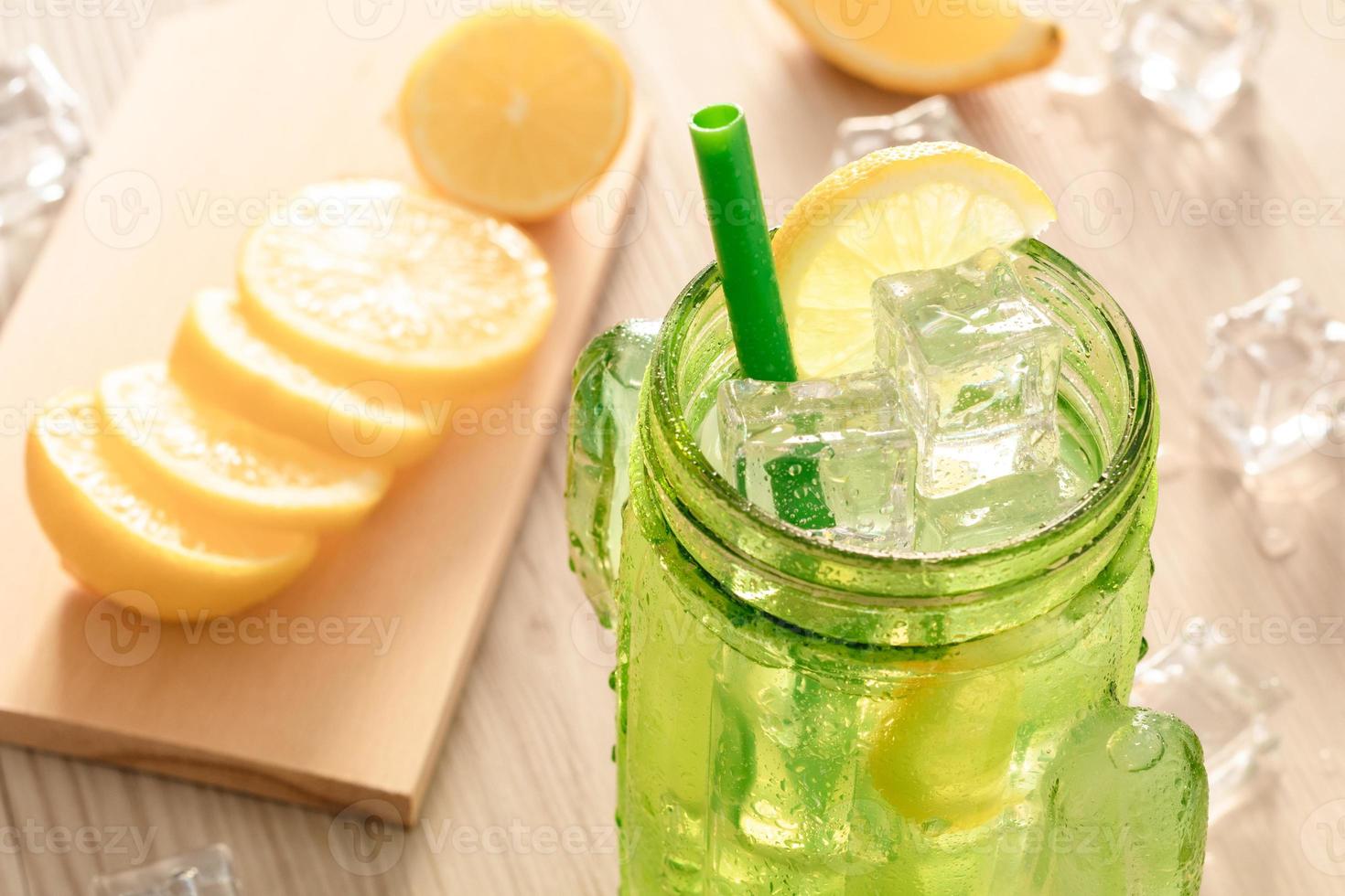 Fresh lemonade in jar ready to drink photo