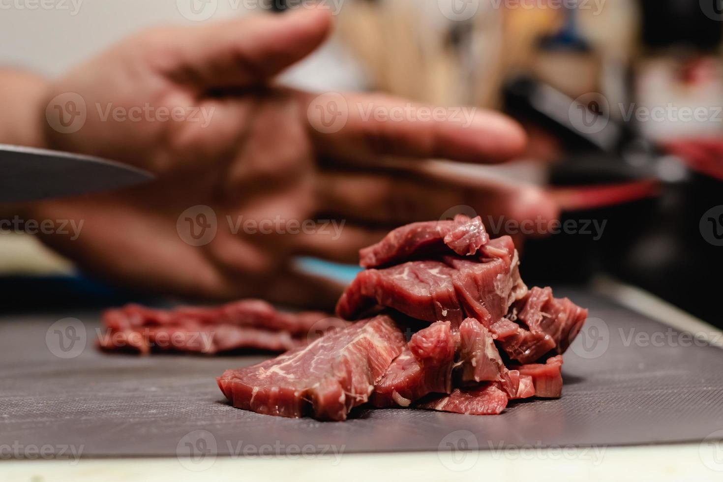 Chef preparing steak tartar of old cow sirloin with 40 days of maturation on restaurant photo