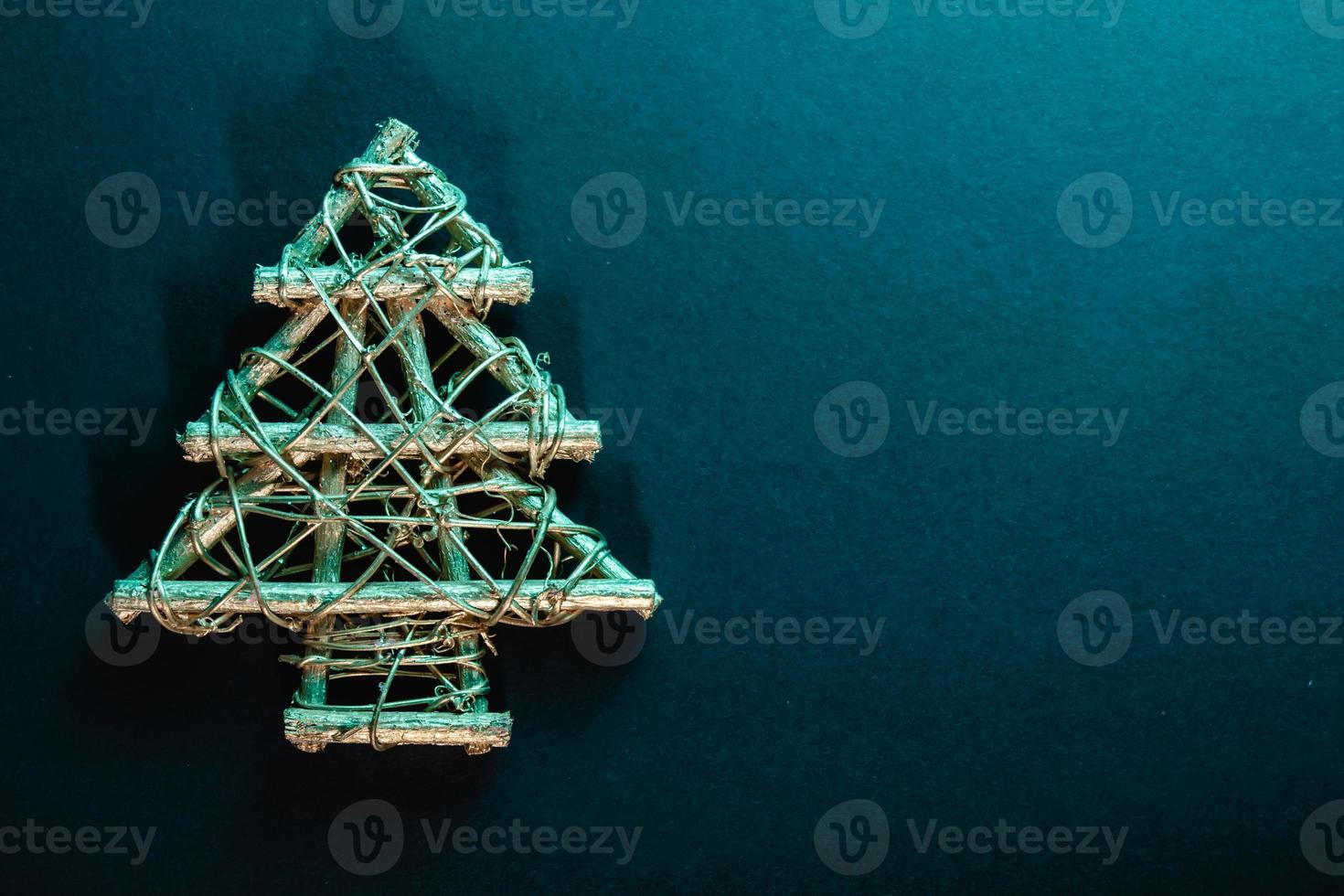 Christmas tree on black background and copy space photo
