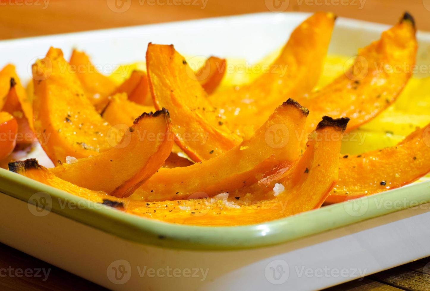 Baked pumpkin slices with potato photo